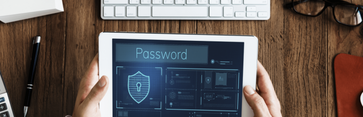 hands working digital device network graphic overlay min 1 728x235 -